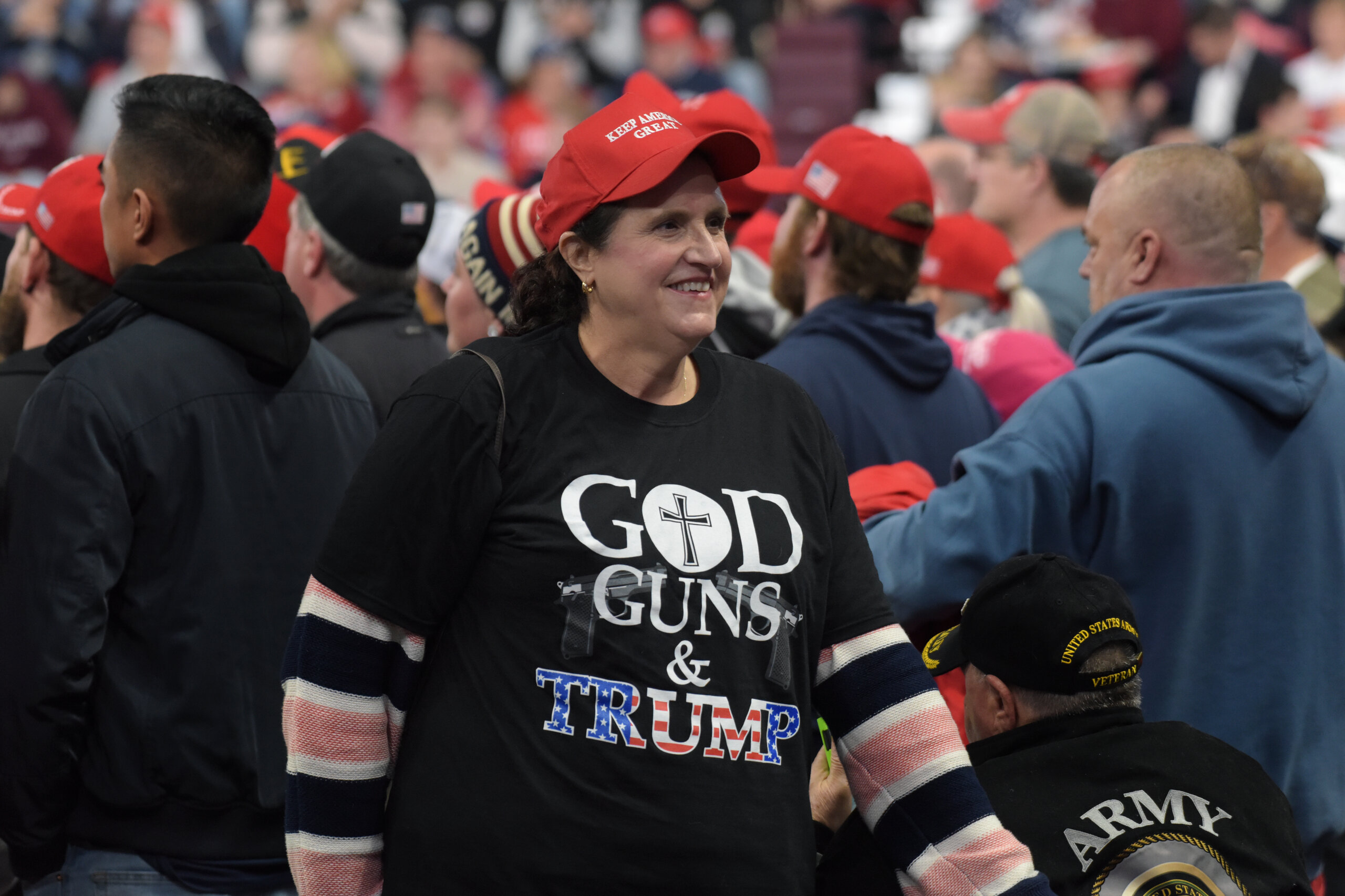 Woman with God, Guns & Trump t-shirt